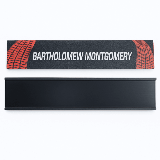 Custom black and red nameplate with 'Bartholomew Montgomery'.