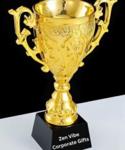Ornate gold trophy cup with black base