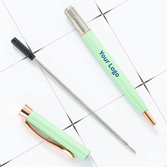 Green pen with a customizable logo on a tiled surface.