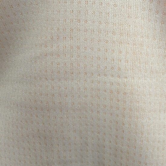 Close-up of beige fabric with a fine woven texture.