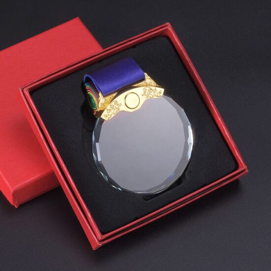 Faceted crystal medal with purple ribbon